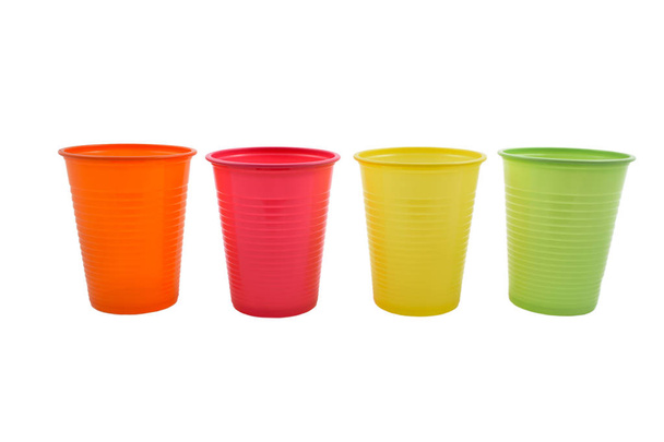 Set of color cups stock images. Colorful party cups. Colored cups on a white background - Fotoğraf, Görsel