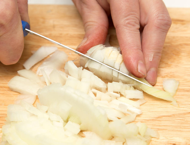 Cook chopped onion on the board - Zdjęcie, obraz