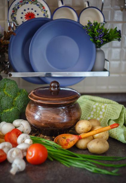 still life with pot and vegetables - 写真・画像