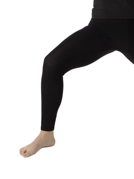 female leg wearing black leggings - Photo, Image