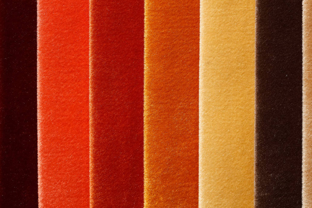 Contrast textile samples in warm tones. - Photo, Image