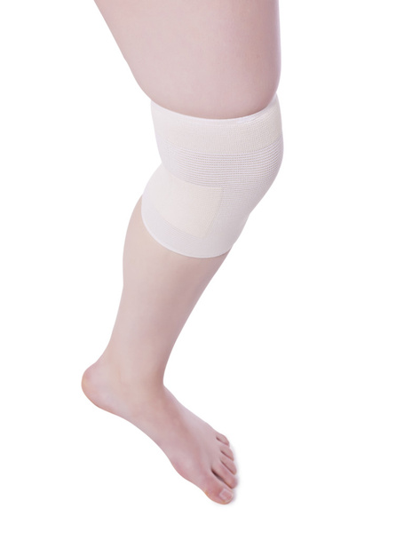 knee with bandage - Fotó, kép