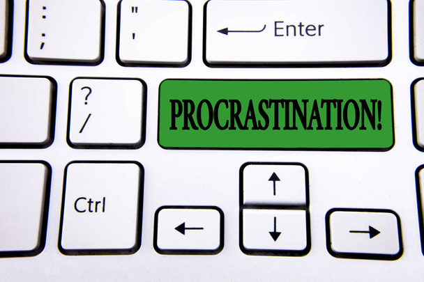 Handwriting text writing Procrastination Motivational Call. Concept meaning Delay or Postpone something boring written on Green Key Button on White Keyboard with copy space. Top view. - Photo, Image