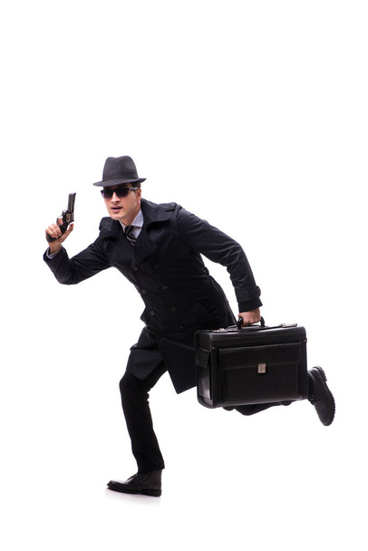 Férfi kém pisztollyal elszigetelt fehér háttér - Fotó, kép