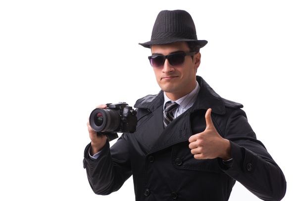 Espía con cámara tomando fotos aisladas en blanco - Foto, imagen