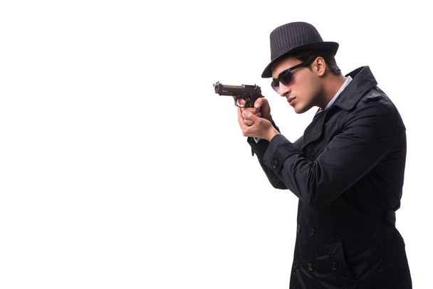 człowiek szpieg z pistolet odizolowany na białym tle - Zdjęcie, obraz