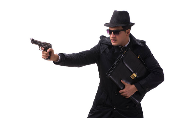 Muž špion s pistolí izolované na bílém pozadí - Fotografie, Obrázek