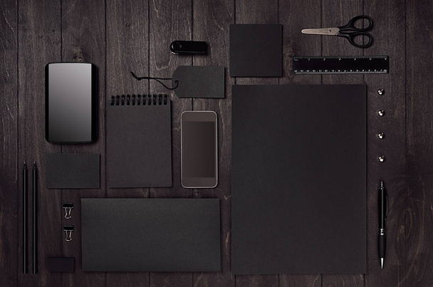 Corporate identity set of blank black stationery with phone on luxury dark wood board. Template for branding, business presentations and portfolios. - Valokuva, kuva