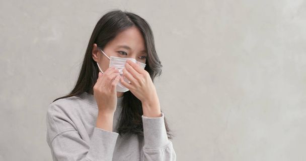 Woman coughing and wearing face mask  - Photo, Image