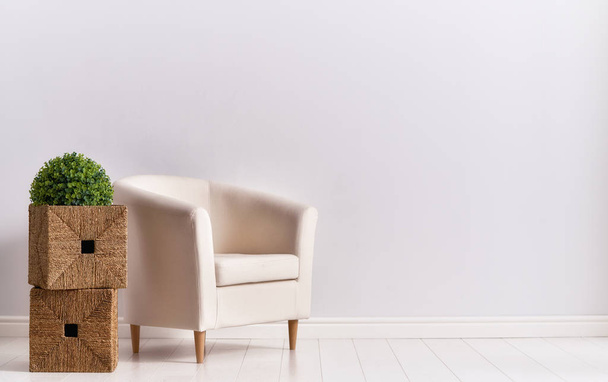 armchair on empty wall - Fotó, kép