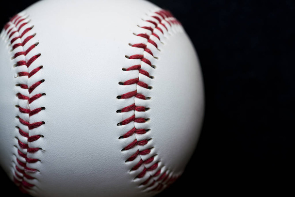 close up baseball on black background, sport team concept - Foto, Imagen