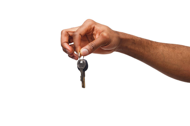 Black male hand holding key to your dream - Foto, Bild