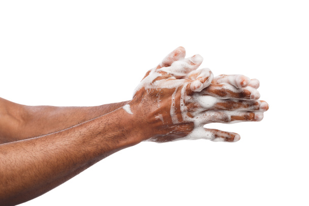 Nero uomo lavaggio mani isolato su sfondo bianco
 - Foto, immagini