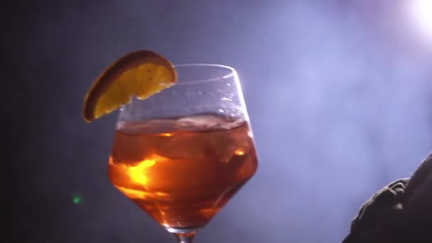 Young woman with glass of cocktail - Filmmaterial, Video