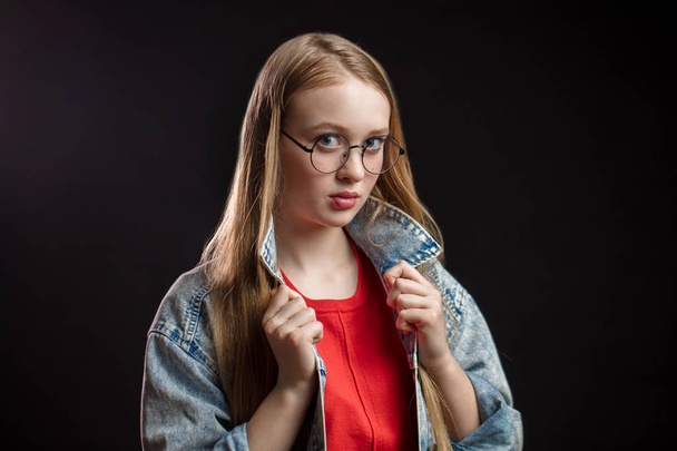Close up shot of stylish young woman in glasses - Foto, Imagen