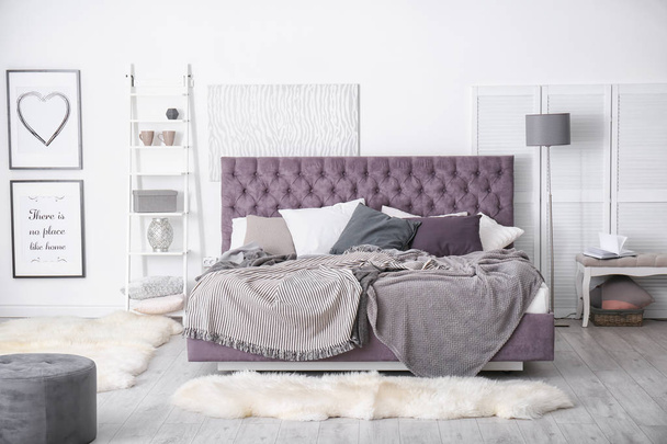 Bedroom interior with comfortable soft bed - Fotoğraf, Görsel