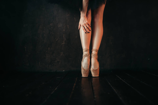 legs and feet of beautiful ballerina in point shoes - Foto, immagini