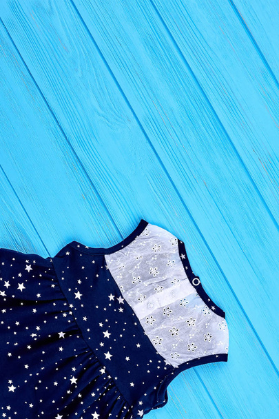 Beautiful sleeveless baby dress, top view. - Photo, Image