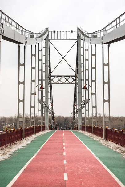 bridge with red road with markings - Фото, зображення