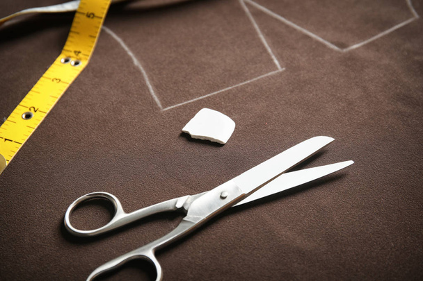 Tailoring tools on fabric with pattern template - Φωτογραφία, εικόνα