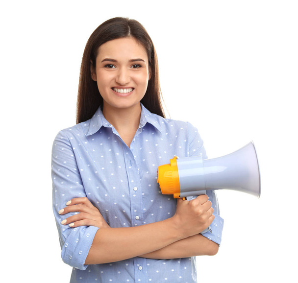 Young woman with megaphone on white background - Fotó, kép
