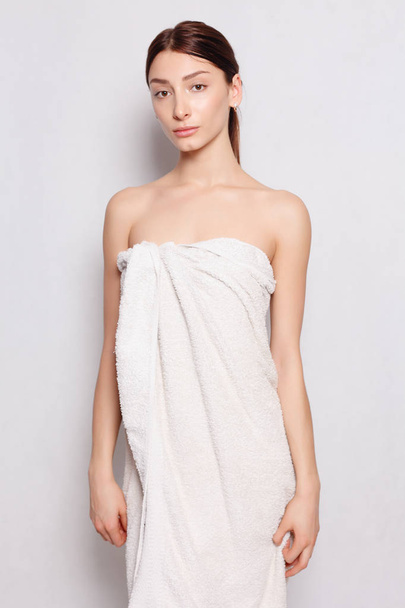 Beautiful woman in white bathrobe after spa - Zdjęcie, obraz