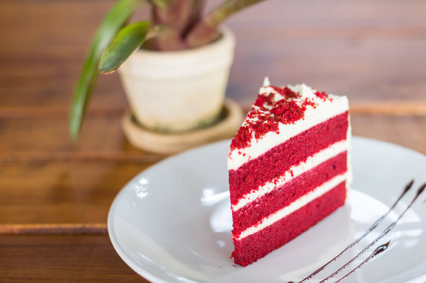 delicious chocolate cake with red and white cream - Photo, Image