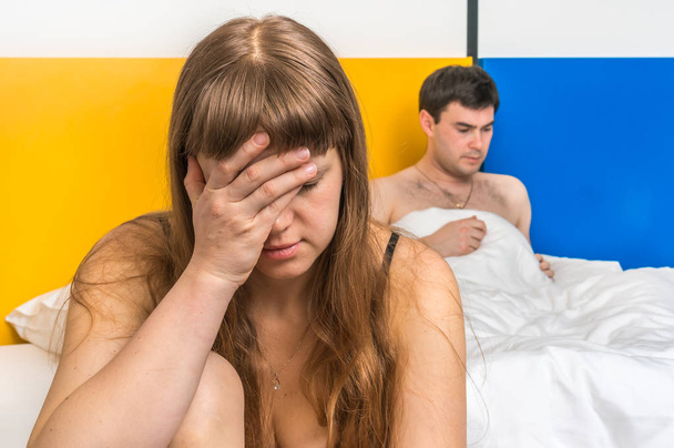 Couple having conflict in bed at home - family quarrel concept - Foto, Bild