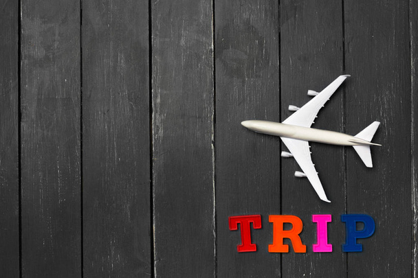 Model airplane on the wooden background - Φωτογραφία, εικόνα