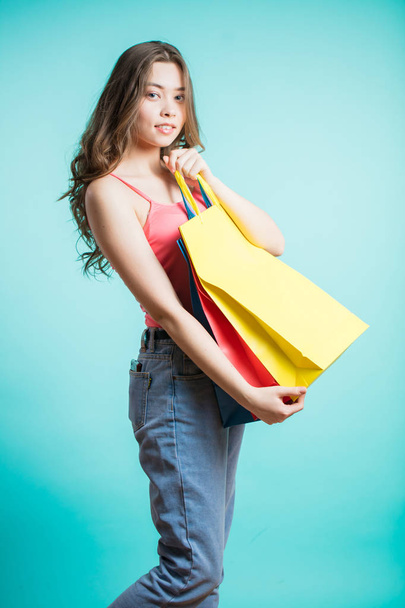Shopping woman holding shopping bags - 写真・画像