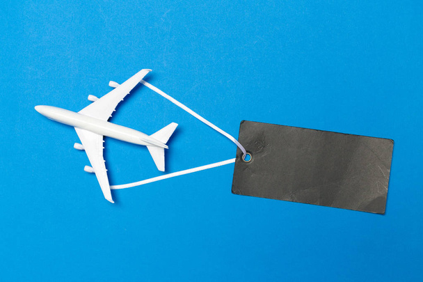 model of passenger plane on blue background - Valokuva, kuva