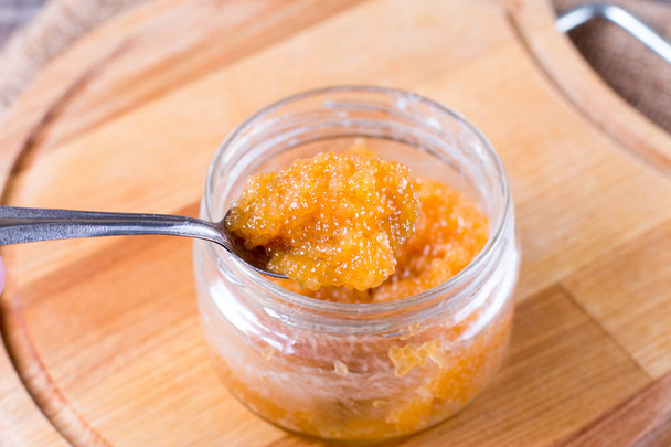 Salty yellow caviar of pike fish with spoon - Photo, Image
