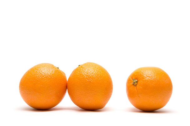Orange on white background - Фото, изображение