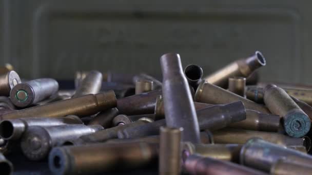 bullets, ammo, placed on a black table - Footage, Video