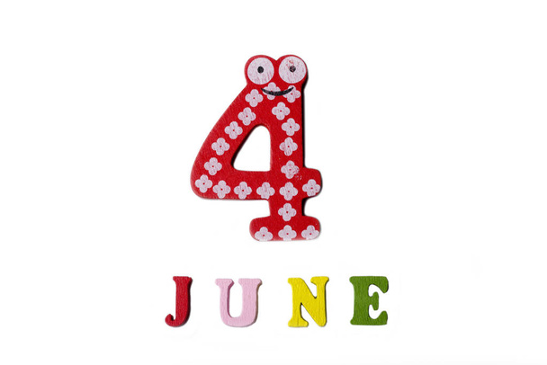 The number four and the word June on a white background. - Photo, Image
