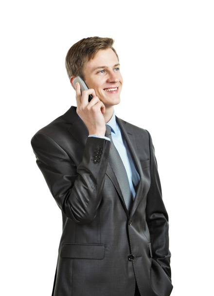 Successful businessman with phone - Foto, afbeelding