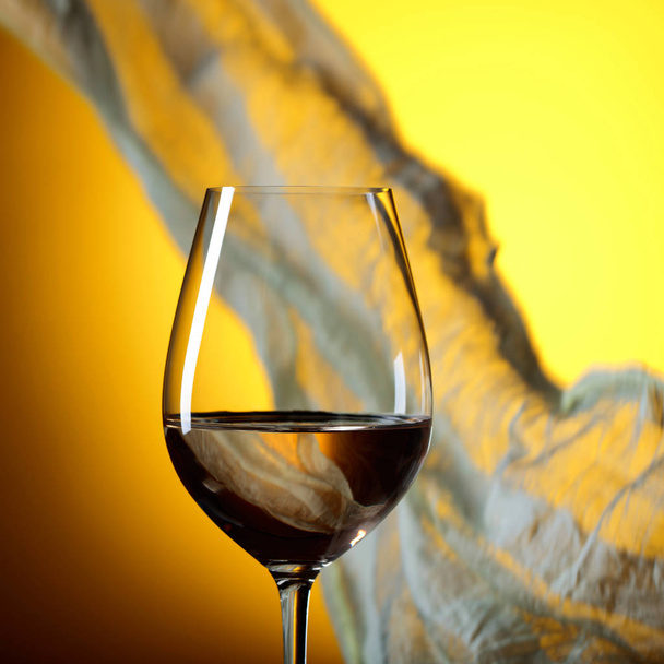 Glass of white wine on a yellow background.  - Photo, Image