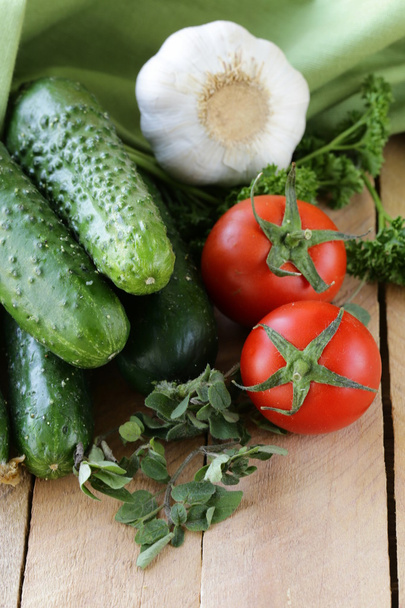 Fresh vegetables cucumber, tomato and garlic - Foto, imagen
