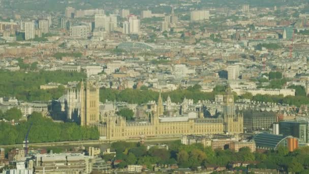 Aerial sunrise view London cityscape Big Ben Houses of Parliament Palace of Westminster River Thames England UK  - Materiał filmowy, wideo