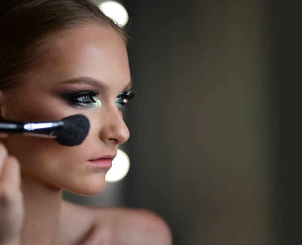Makeup, make up applying closeup. Cosmetic powder brush for make up, copy space - Fotó, kép