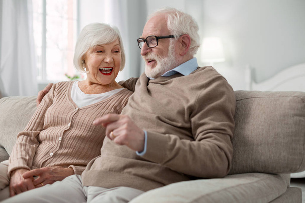 Delighted senior couple relaxing at home - Photo, image