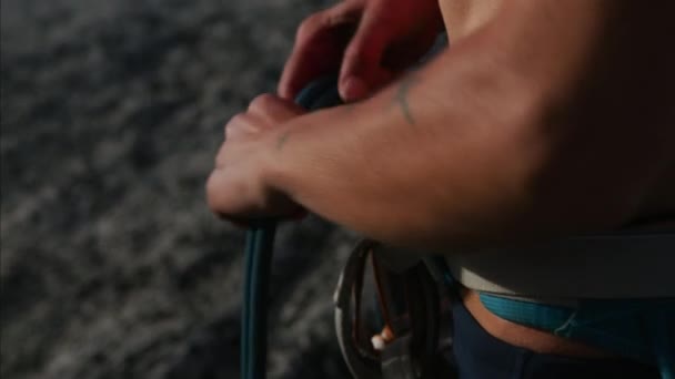 Active Caucasian American female rock climber preparing climbing safety rope outdoors Squamish Valley Canada - Footage, Video