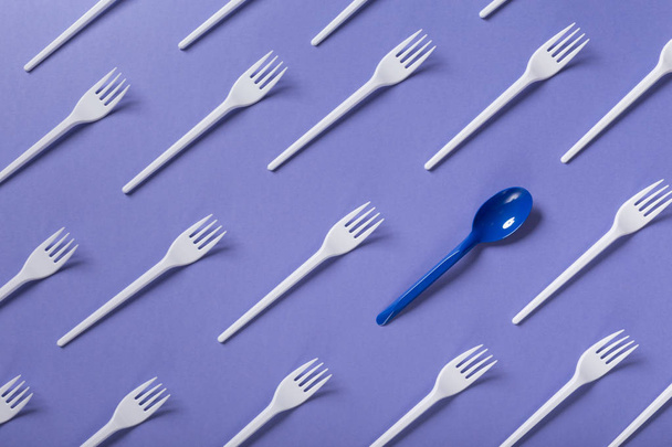 Top view on plastic forks on violet background - Photo, Image