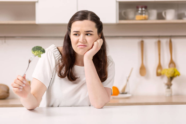 Depressed reckless woman staying on diet - Photo, Image