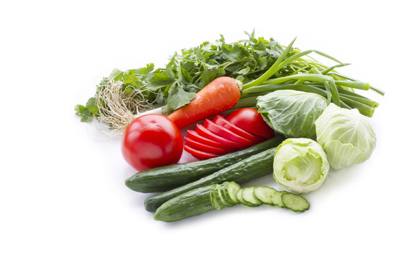 Tomatoes, cucumbers, cabbage, green onions and cilantro. - Photo, image