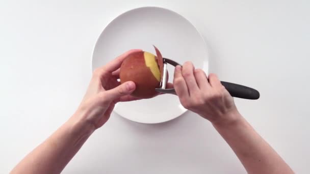 A woman peeled the apple. Part 1. - Footage, Video