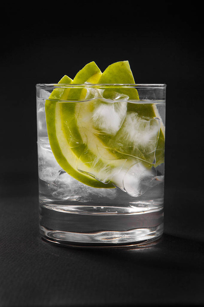 Summer cocktail on isolated black background - Photo, Image