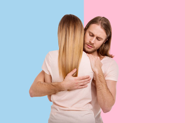 Pleasant man holding his girlfriend tight - Φωτογραφία, εικόνα