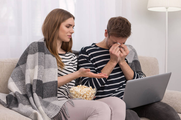 Loyal couple watching a film together - Foto, Bild