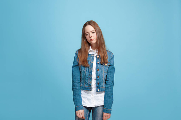 Young serious thoughtful teen girl. Doubt concept. - Zdjęcie, obraz